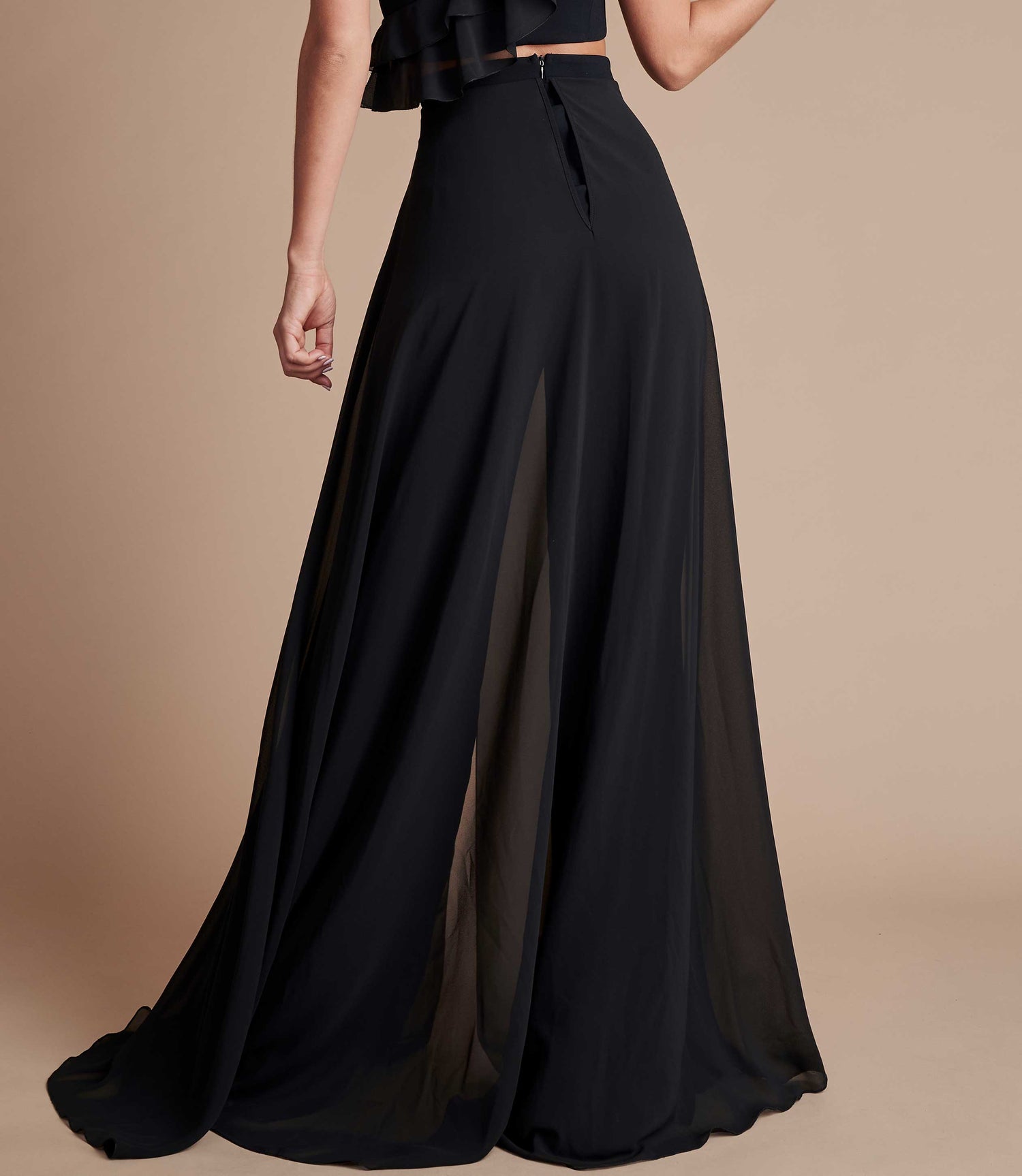 Black high-waisted wide leg trouser with floaty chiffon.