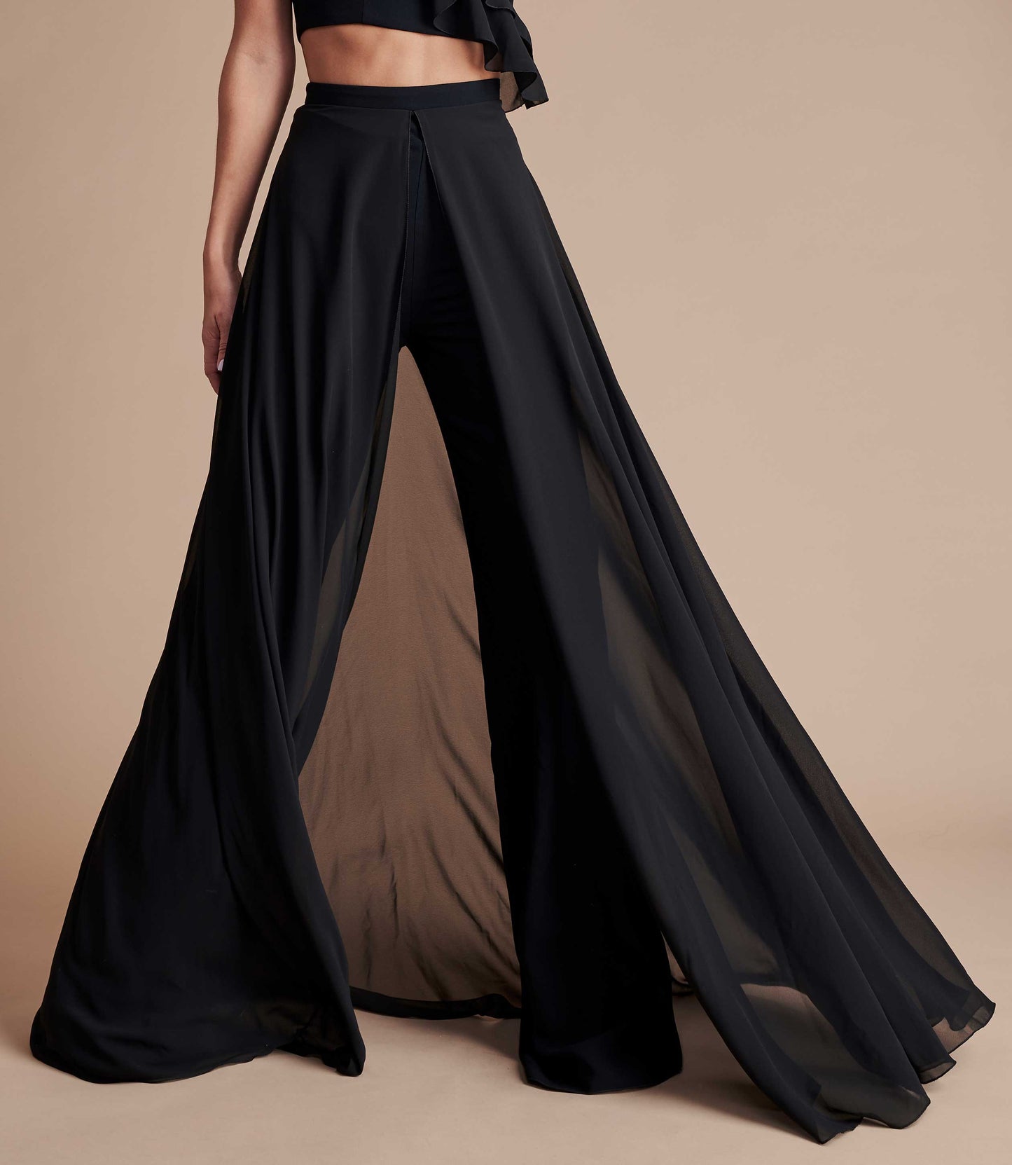 Black high-waisted wide leg trouser with floaty chiffon.