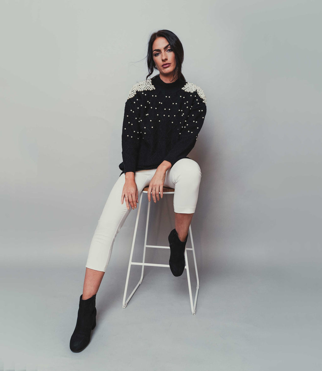 black jumper with mock pearls
