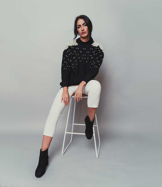 black jumper with mock pearls
