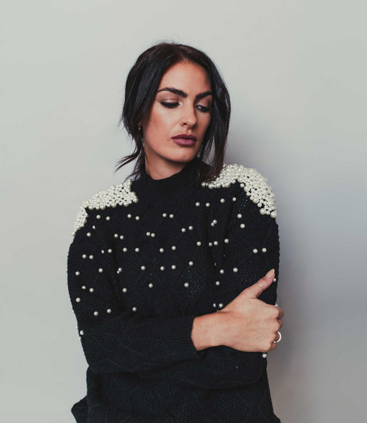 black jumper with mock pearls